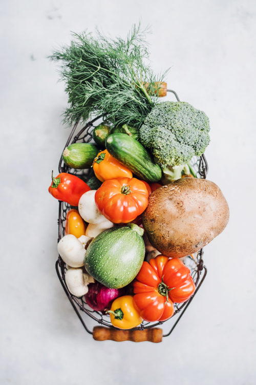 Image shows a plate of fresh vegetables